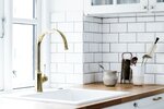 Close up of the Damixa Tradition polished brass mixer